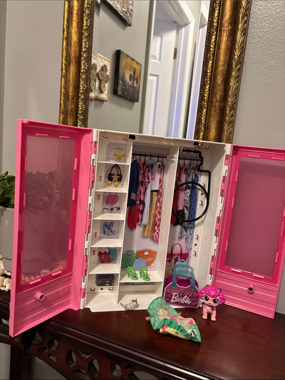 2018 Barbie Pink Closet/Carrying case. Has a Pet Pink Poodle and Barbie clothes